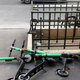 Electric scooters for sharing lay on the sidewalk outside a subway station in Paris, Thursday, March 21, 2019.